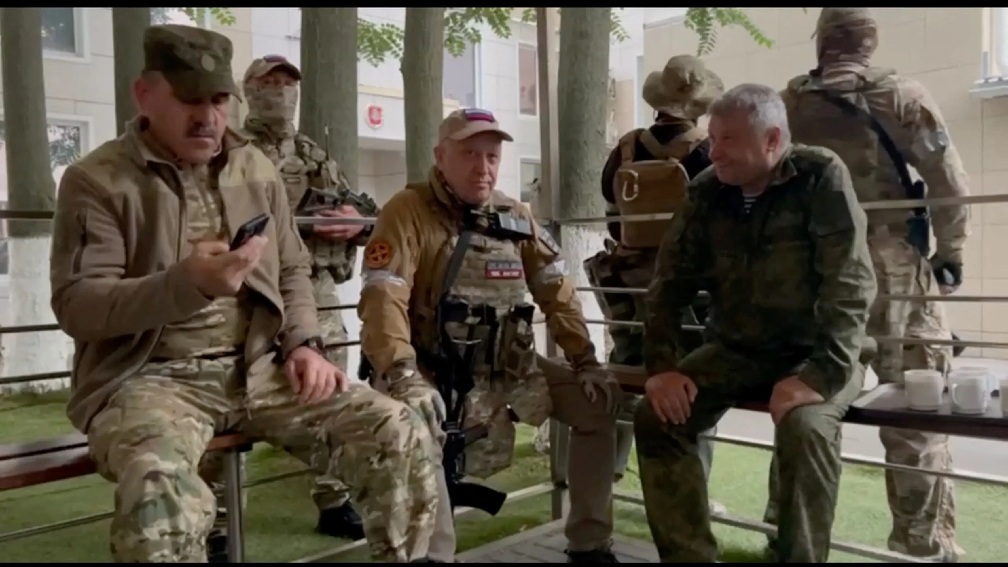 Founder of Wagner private mercenary group Yevgeny Prigozhin and Russian Wagner Group fighters at the headquarters of the Southern Military District of the Russian Armed Forces in Rostov-on-Don