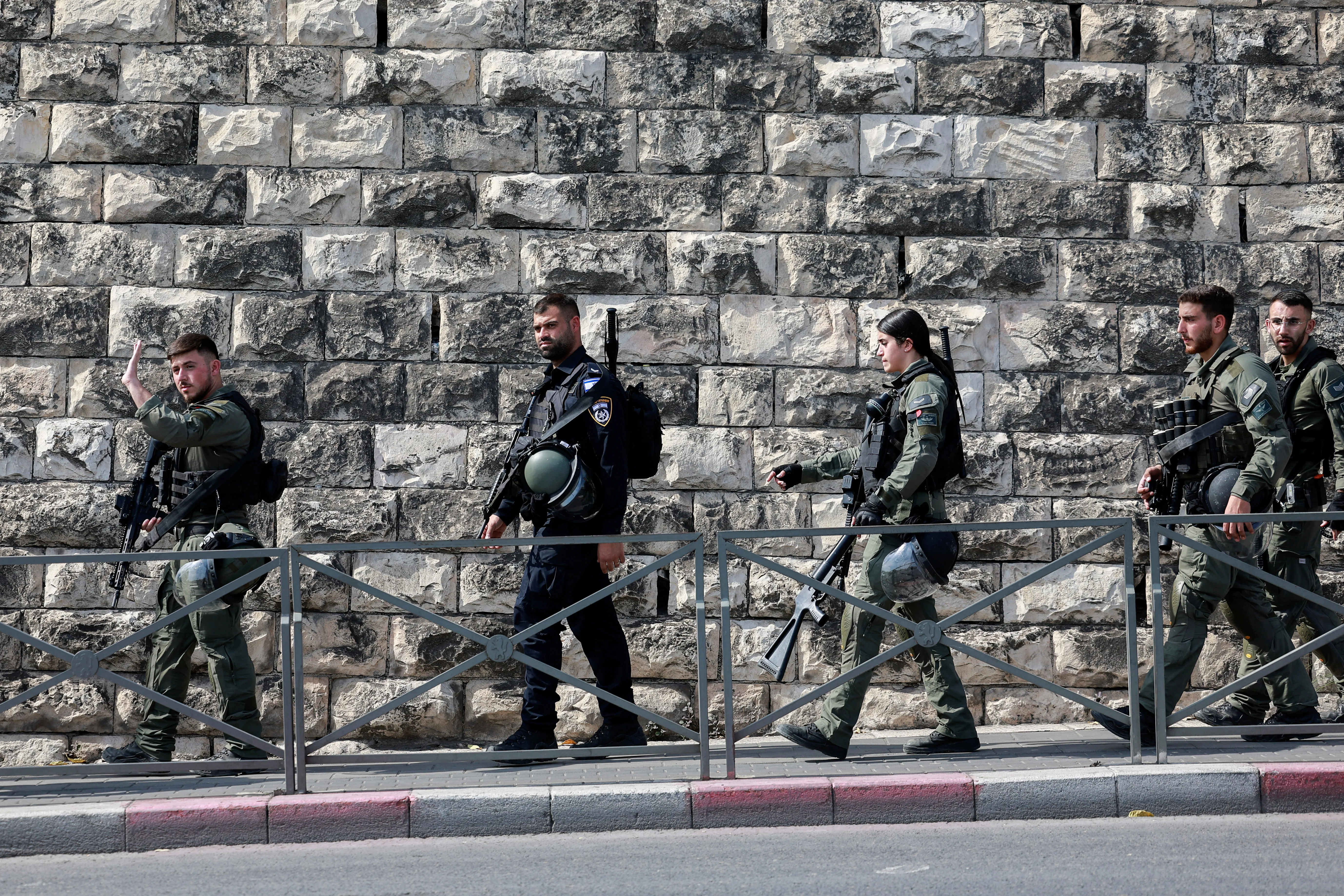 Israeli Border police patrol, by Jerusalem's Old City
