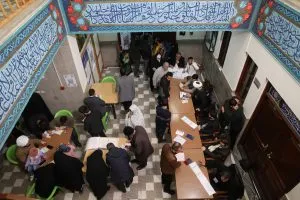 Iranians vote during parliamentary elections at a polling station in Tehran