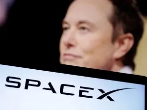FILE PHOTO: FILE PHOTO: Illustration shows SpaceX logo and Elon Musk photo