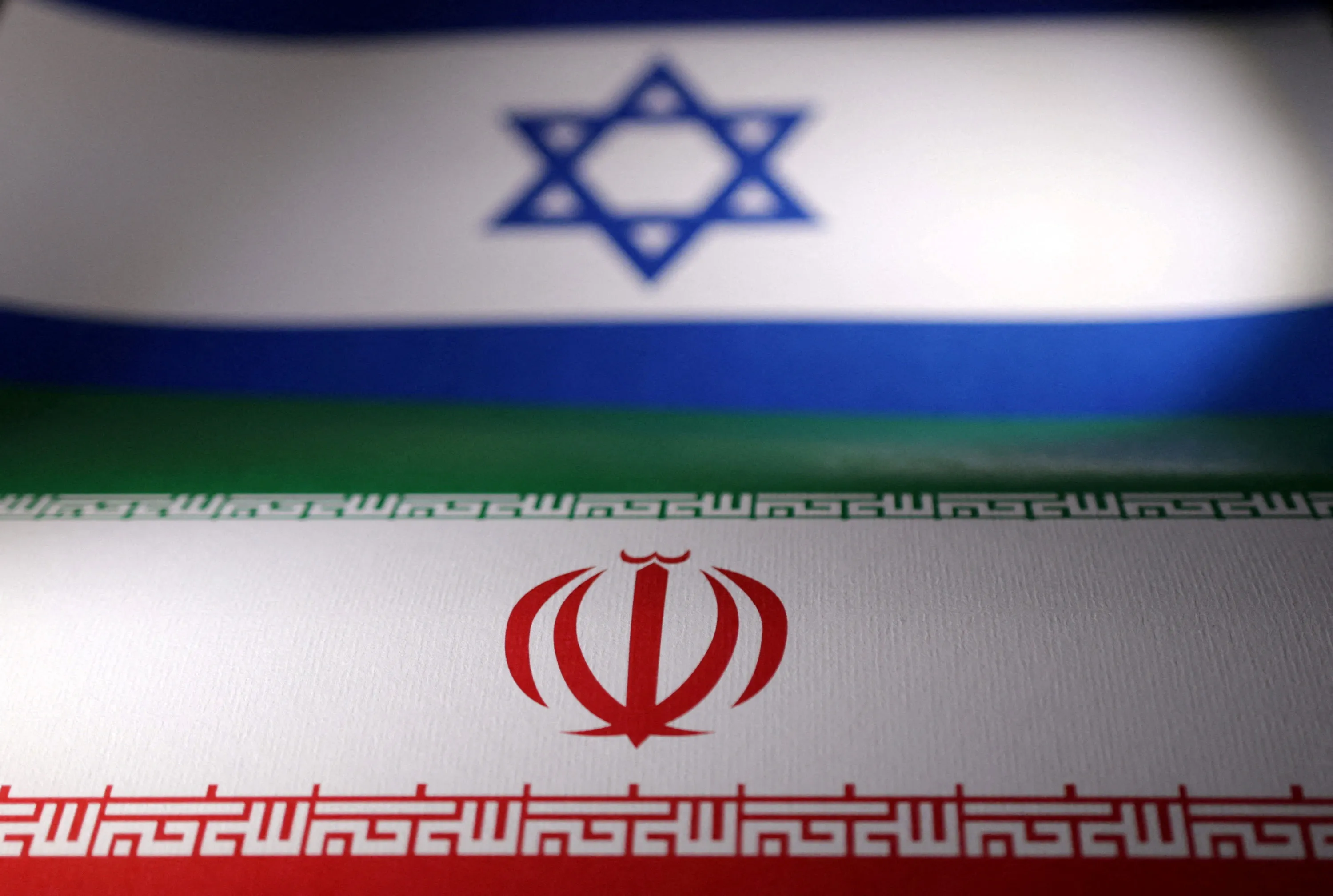 FILE PHOTO: Illustration shows Israeli and Iranian flags