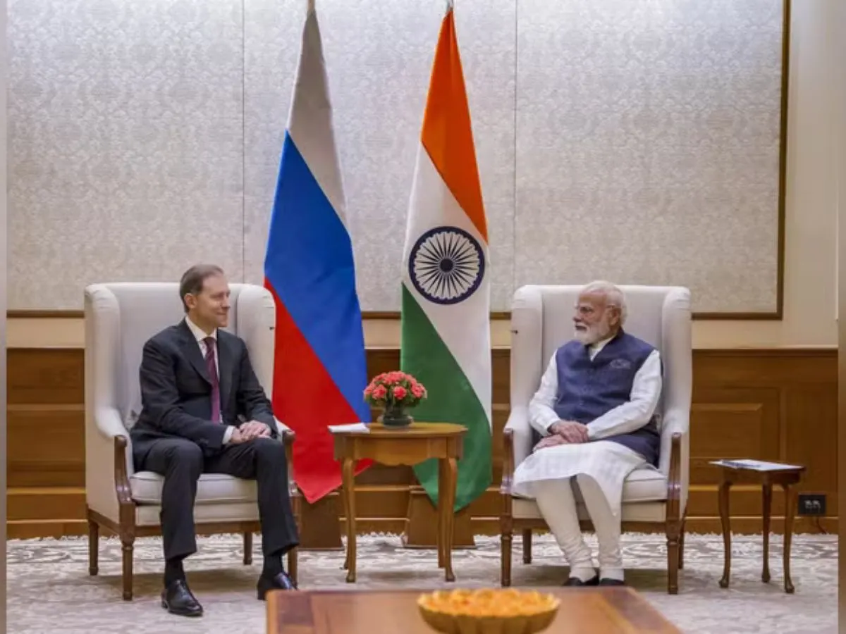 Prime Minister Narendra Modi with Russia First Deputy Chairman Denis Manturov
